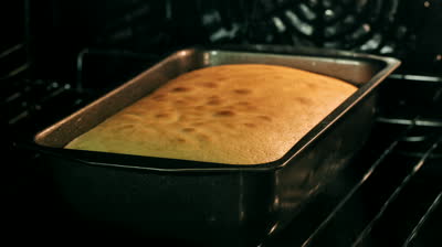 stock-footage-cake-baking-time-lapse-a-slow-panning-timelapse-footage-of-a-madeira-cake-baking-in-a-fan-forced.jpg